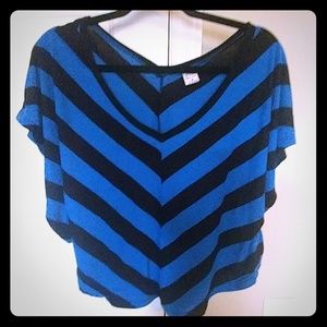 Off one shoulder blue and black shirt